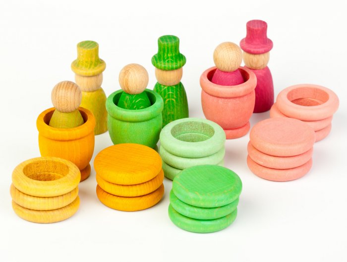 Grapat Summer Nins Seasonal Play Set, including nins, magos, mates, rings and coins in fresh spring colours of pink, green and yellow. Perfect for open-ended play. White background. 