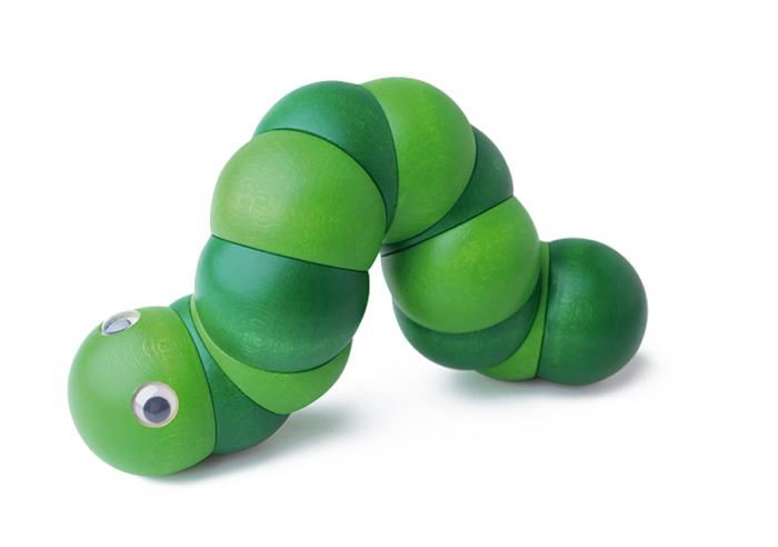 Green Naef Juba worm toy laying on a white background.