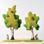 Bumbu medium and large eco-friendly wooden birch tree toys on a white background