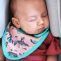 Sleeping baby Pop-in Ferret light pink stage 1 bib with ferrets and cacti, adjustable poppers