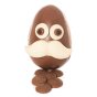 Cocoa Loco eco-friendly Fairtrade milk chocolate funny face Easter egg on a white background next to some chocolate buttons