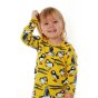 Close up of child stood on a white background wearing the DUNS Sweden organic cotton long sleeve top in the lemon chrome puffin print