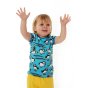 Close up of child stood on a white background wearing the organic cotton DUNS Sweden blue atoll puffin t-shirt