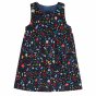 Frugi reversible floral organic cotton childrens hope dress on a white background