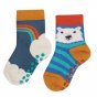 One sock from the Frugi india ink and rainbow grippy socks twin pack on a white background