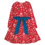 Frugi red let's party long sleeve skater dress from the back with blue waist band bow and Christmas theme party print with bears, rabbits holding gifts, penguins in arty hats and Christmas Trees on white background