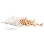 Grapat eco-friendly natural wooden mandala toy pieces pouring out of a white string bag on a white background