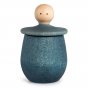 Blue Grapat Little Thing pot, with lid upturned revealing face, on a white background.