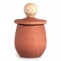 Orange Grapat Little Thing pot, with lid upturned revealing face, on a white background.
