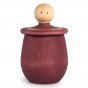 Red Grapat Little Thing wooden pot with lid flipped over, revealing face underneath, on a white background.