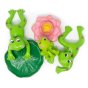 Green rubber toys eco-friendly natural rubber green frog family toy set laid out on a white background
