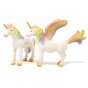 Green rubber toys natural rubber rainbow unicorn and pegasus figures stood on a white background