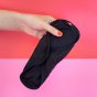 Hey Girls Black Full Cycle Reusable Period Kit - one pa held in someone's hand on a red and pink background