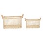 2 Olli ella natural woven rattan cabouche baskets on a white background