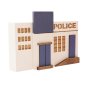 Close up of the Papoose childrens handmade wooden toy police station on a white background