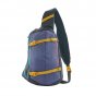 Patagonia eco-friendly patchwork smolder blue atom sling pack on a white background