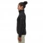 Woman stood sideways wearing the Patagonia eco-friendly thermal winter fleece jacket on a white background