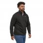 Man wearing the Patagonia insulated better sweater fleece jacket on a white background