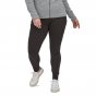 Women wearing the Patagonia eco-friendly organic cotton black pack out tights on a white background