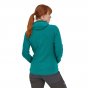 Woman stood backwards wearing the Patagonia eco-friendly womens zip up hoody on a white background