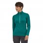 Woman wearing the Patagonia eco-friendly recycled polyester daily zip neck top on a white background