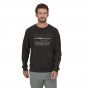 Man wearing the organic cotton Patagonia classic 73 skyline crew sweatshirt in black on a white background