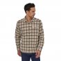 Man wearing the Patagonia eco-friendly cotton fjord flannel shirt on a white background