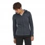 Woman wearing the Patagonia eco-friendly 100% recycled polyester hooded R1 air hoody on a white background