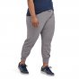 Woman wearing the Patagonia grey cotton Ahnya bottoms on a white background