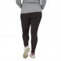 Lady facing backwards wearing the Patagonia organic pack out leggings on a white background