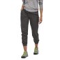 Woman stood on a white background wearing the Patagonia black hampi rock pants