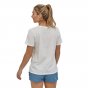 Woman stood backwards wearing the Patagonia p-6 pastel logo crew t-shirt on a white background