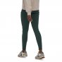 Woman stood backwards in the eco-friendly Patagonia activewear pack out tights on a white background