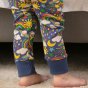 close up of child wearing blue cuffed leggings in the Cosmic Weather print from piccalilly