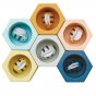 Plan Toys Bee Hives - Orchard colours, eco-friendly solid rubberwood play set for early years preschoolers, for fine motor skills and colour recognition. White background, from above.