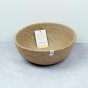 ReSpiin Jute Natural Large woven Bowl with white respiin label on aa grey surface, off-white background and product label inside