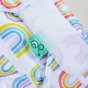 Tots Bots Reusable washable easyfit nappy with rainbows all over on white background