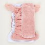 Tots bots bamboozle reusable nappy system laid out on a beige background