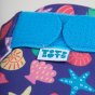 Close up of the velcro closure on the Totsbots mussel sea shell eco-friendly reusable swimming nappy
