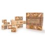 Uncle Goose plastic free fossil cube toys stacked on a white background next to their box