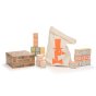 Uncle Goose eco-friendly wooden alphabet blocks next to their box and a large canvas carry bag