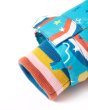 Close up of the striped sleeve on the Frugi eco-friendly rainbow print winter jacket on a white background