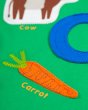 Close up of the embroidered carrot on the Frugi childrens avery t-shirt 