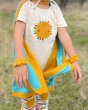 Close up of a child wearing the organic cotton LGR childrens sunshine applique top