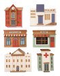 Papoose hand crafted wooden town building toys laid out on a white background