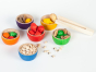 Grapat Wooden Toy Bowls & Acorns Set - 6 rainbow coloured small wooden bowls each with coloured acorns, and other natural loose parts and a set of wooden tweezers. White background.
