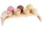 The PlanToys Ice Cream play food set includes a wooden serving tray to hold the two cones, strawberry, vanilla and chocolate ice cream scoops, cream topping and scooper. White background. 