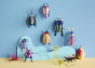 Studio Roof beetles and insects pictured hung up on a blue coloured wall