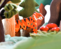 Close up of Bajo Endangered Animals Tiger in a felt toy forest scene