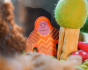 Close up of Bajo Toys Endangered Animals Orangutan in a felt toy forest scene